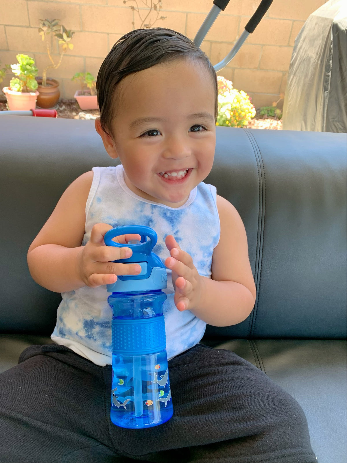Nuby Thirsty Kids Push Button Flip-it Soft Spout on The Go Water Bottle with Easy Grip Band, Blue Sharks, 12 Oz