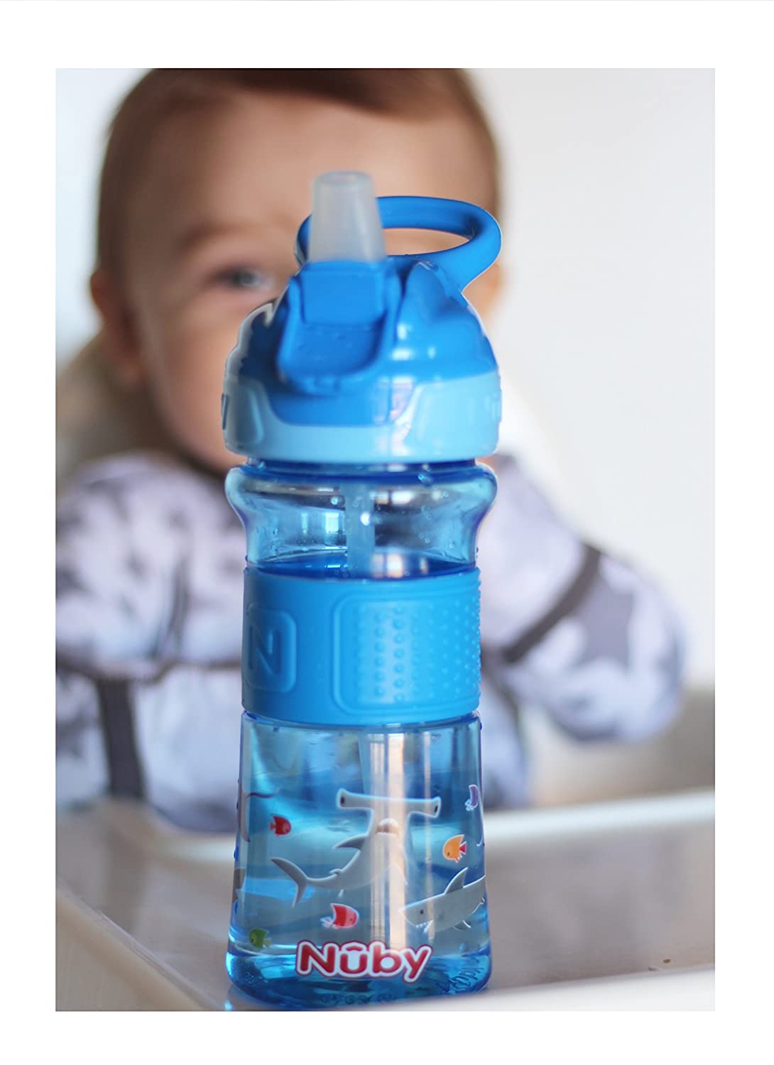 Nuby Thirsty Kids Push Button Flip-it Soft Spout on The Go Water Bottle with Easy Grip Band, Blue Sharks, 12 Oz