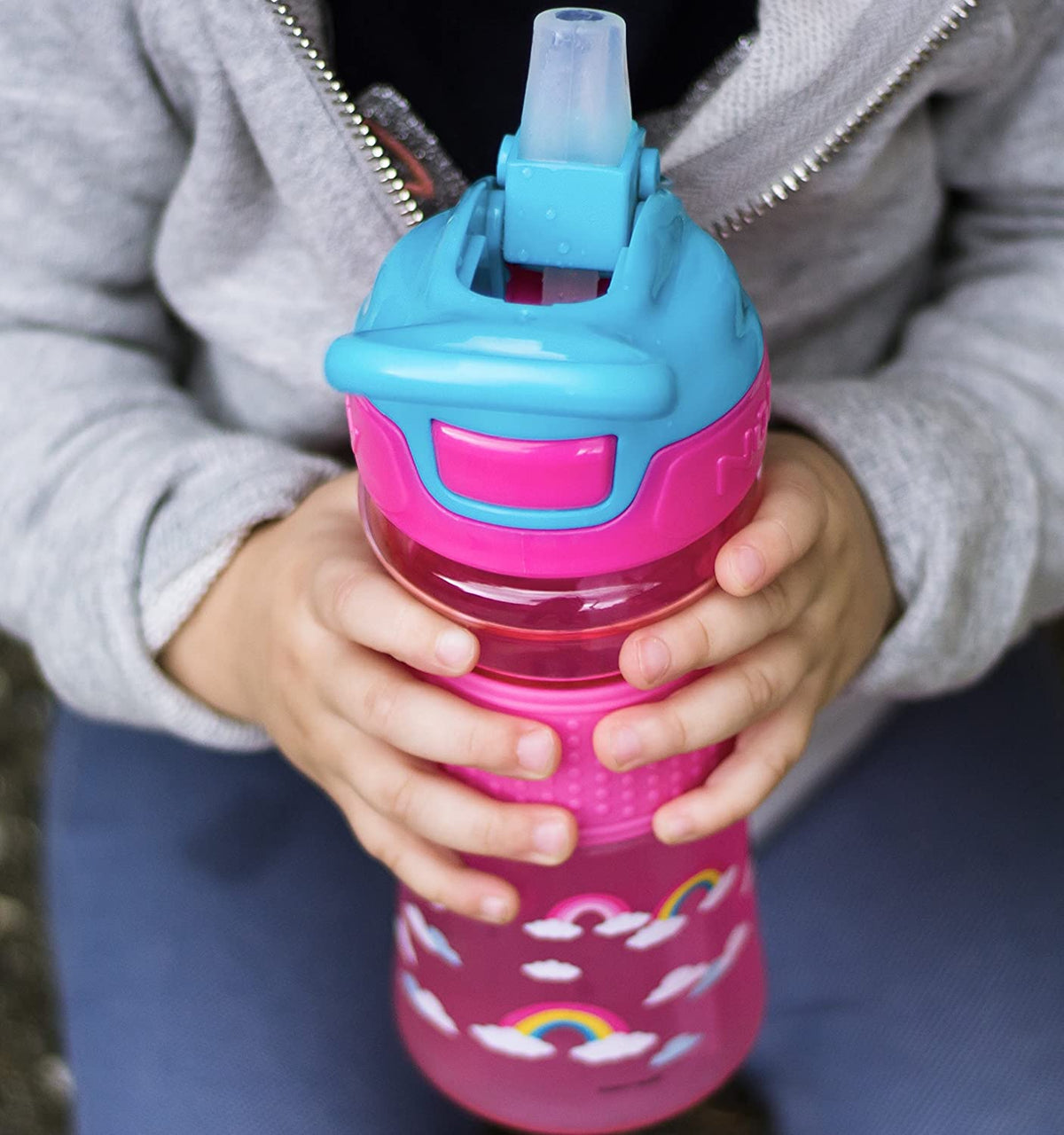 NUBY Thirsty Kids Push Button Flip-it Soft Spout on The Go Water Bottle with Easy Grip Band, Pink Rainbow, 12oz